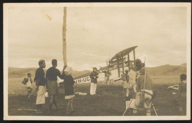 [Michael Leahy is making a movie of the plane Canberra and preparations are being made for the walk to Mt. Hagen, Central New Guinea], 1933