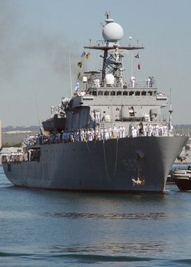 Port bow view of the Republic of Korea (KOR) Mine Layer WON SAN (MLS 560), showing Sailors manning the rails, as the ship enters the harbor at Pearl Harbor, Hawaii (HI), for a three-day port visit