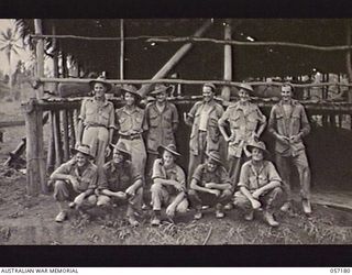 TERAPO, NEW GUINEA. 1943-09-07. TROOPS OF THE 2/2ND AUSTRALIAN GRAVES REGISTRATION UNIT, 2/3RD AUSTRALIAN INDEPENDENT COMPANY AND THE 3RD AUSTRALIAN DIVISION POSTAL UNIT AWAITING TRANSPORT TO PORT ..