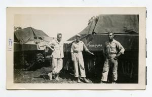[Photograph of Soldier and Tank]