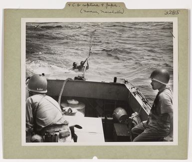 Photograph of Japanese Soldiers Surrendering to Coast Guard at Kwajalein