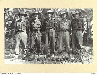 NEW GUINEA. 1944-05-01. PERSONNEL OF H SECTION, FIELD SECURITY WING. IDENTIFIED PERSONNEL ARE:- NX100450 LANCE-CORPORAL J. E. SUTTOR (1); NX86967 LANCE-SERGEANT F. C. WINN (2); NX113170 CAPTAIN W. ..