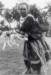 An old woman, who taught the dance, dance in honor of the delegates gathered in Mou