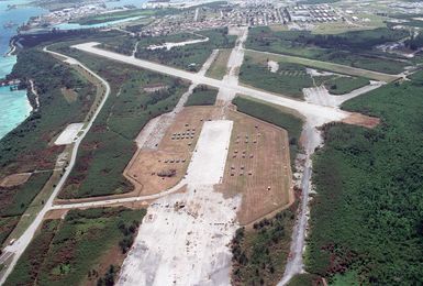 Aerial view of Orote Point, Guam showing the tent city living facilities for deployed US Military personnel during Exercise TANDEM TRHUST 99