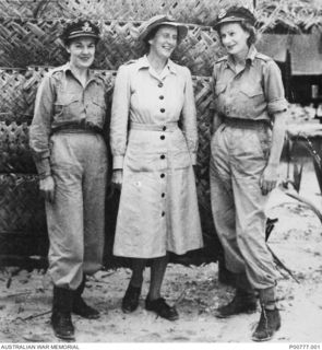 NEW GUINEA. C.1944-01. LEFT TO RIGHT: WARRANT OFFICER RUBY HUDSON, WOMENS AUXILIARY AUSTRALIAN AIR FORCE (WAAAF); SISTER A. J. WHEATLEY, ROYAL AUSTRALIAN AIR FORCE NURSING SERVICE; SECTION OFFICER ..