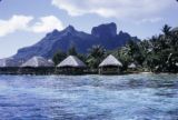 French Polynesia, overwater cabins on shore of Bora Bora