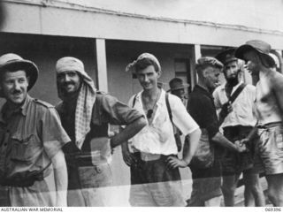 PORT MORESBY, NEW GUINEA. 1942-04-12. EVACUEES FROM NEW BRITAIN, COMPRISING SERVICE PERSONNEL AND CIVILIANS WHO WERE EVACUATED FROM PALMALMAL ON THE SOUTH COAST OF NEW BRITAIN BY THE HMAS ..