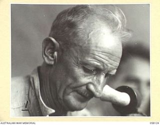 SALAMAUA, NEW GUINEA, 1943-09-26. A MEMBER OF THE 542ND AMPHIBIAN ENGINEERS (UNITED STATES)