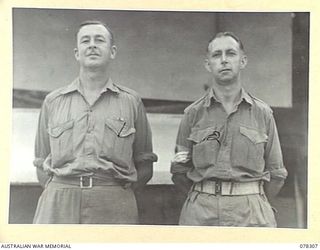 SIPAAI, BOUGAINVILLE ISLAND. 1945-01-08. PERMIT PHOTOGRAPH TAKEN FOR THE 29TH FIELD SECURITY SECTION. SEEN ARE:- NX55104 WARRANT OFFICER II, A.D. KEIR (1); NX81553 STAFF SERGEANT J. ROUGH (2)