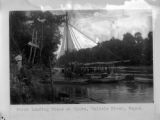 Papua New Guinea, people on boat and pier at Vailala River