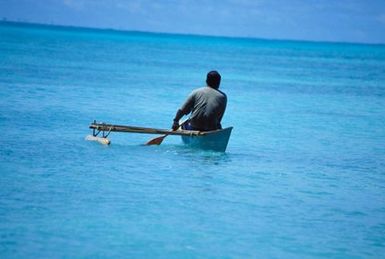 Canoes sailing