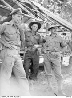 RABAUL, NEW BRITAIN. 1945-11-15. AN IDENTIFICATION PARADE OF SUSPECTED JAPANESE WAR CRIMINALS WAS ARRANGED BY THE WAR CRIMES COMMISSION, AT HEADQUARTERS 11 DIVISION. SHOWN, OFFICERS WHO WERE ..