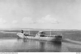 1940-04-15. AERIAL STARBOARD BOW VIEW OF THE NORWEGIAN TANKER NORDEN WHICH WAS IN AUSTRALIAN WATERS WHEN BROUGHT UNDER BRITISH CONTROL AFTER THE GERMAN INVASION OF NORWAY IN 1940-04. SHE ..