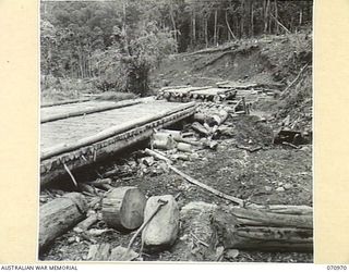 ZENAG, NEW GUINESA, 1944-02-28. A BRIDGE UNDER CONSTRUCTION SPANNING THE PURINEN RIVER 59 MILES FROM WAU