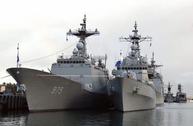 Republic of Korea (ROK) KDX-2 Class Destroyer CHUNGMUGONG YI SUNSHIN (DDG 975) and Kwanggaeto the Great (KDX-1) Class Destroyer EULJIMUNDOK (DDG 972) sit moored at Naval Station Pearl Harbor ready to participate in the multi-national maritime exercise Rim of the Pacific (RIMPAC) 2004. RIMPAC is the largest international maritime exercise in the waters around the Hawaiian Islands. This years exercise includes seven participating nations: Australia, Canada, Chile, Japan, South Korea, the United Kingdom and the United States. RIMPAC enhances the tactical proficiency of participating units in a wide array of combined operations at sea, while enhancing stability in the Pacific Rim region