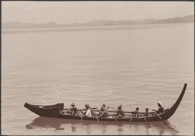 A Florida canoe with crew, Solomon Islands, 1906, 1 / J.W. Beattie