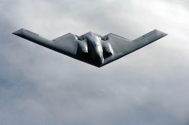 A U.S. Air Force B-2 Spirit bomber aircraft from the 509th Bomber Wing, Whiteman Air Force Base, Mo., soars over the Pacific Ocean during a refueling mission on April 4, 2005. The 509th BW is currently deployed at Andersen Air Force Base, Guam. (U.S. Air Force PHOTO by MASTER SGT. Val Gempis) (Released)