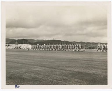 [Servicemen marching in formation, Saipan]