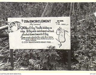 FINSCHHAFEN AREA, NEW GUINEA, 1944-03-17. ONE OF MANY BATTLE SIGNS IN THE FINSCHHAFEN AREA, THIS SIGN RECORDS ACTIVITIES OF THE 2/23RD INFANTRY BATTALION