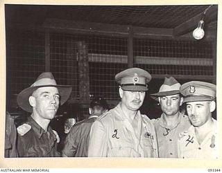 LAE AREA, NEW GUINEA, 1945-06-30. DURING HIS TOUR OF INSPECTION OF AUSTRALIAN TROOPS IN THE LAE AREA, HIS ROYAL HIGHNESS, THE DUKE OF GLOUCESTER, GOVERNOR-GENERAL OF AUSTRALIA (2) VISITED CORPS OF ..