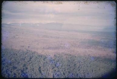 Aerial view of the area on the approach to Embi Lakes following the Mt. Lamington eruption, Papua New Guinea, 1951 / Albert Speer