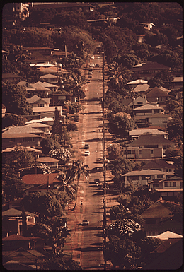 HILLSIDE HOMES ON HONOLULU'S EAST SIDE. STATE LAND USE LAWS HAVE BEEN DESIGNED TO HOLD DOWN FAST DEVELOPMENTS AND TO PROTECT AGRICULTURAL LANDS WHICH ARE THE EASIEST AND MOST ECONOMICAL TO DEVELOP
