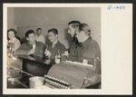 Pvt. Noboru Hashiro and Pvt. Kenichi Kawakami at the refreshment bar near their ward in the Moore General Hospital. Both boys, inducted into the army in Hawaii, received shrapnel wounds while in action with the 100th Battalion in Italy. Photographer: Van Tassel, Gretchen Swannanoa, North Carolina