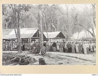 MASAMASA ISLAND, SOLOMON ISLANDS. 1945-11-14. SICK PARADE AT THE REGIMENTAL AID POST IN JAPANESE AREA 13. JAPANESE CONCENTRATED ON THE ISLAND ARE UNDER THE CONTROL OF 7 INFANTRY BATTALION