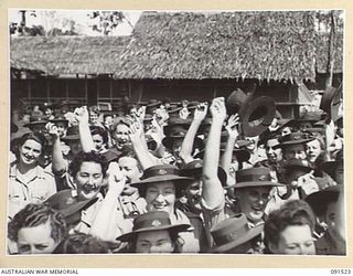LAE, NEW GUINEA, 1945-05-08. AT 1400 HOURS PERSONNEL AT THE AWAS BARRACKS IN BUTIBUM ROAD WERE CALLED TOGETHER AND AN ANNOUNCEMENT WAS MADE THAT GERMANY HAD UNCONDITIONALLY SURRENDERED TO THE ..