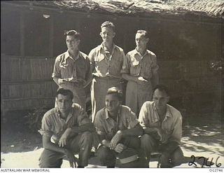 PORT MORESBY, PAPUA. C. 1944. GROUP PORTRAIT OF RAAF AIRMEN (UNIDENTIFIED)