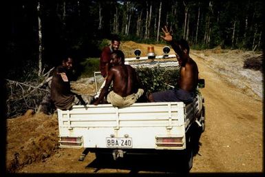 Team members on back of ute (with cash reward)