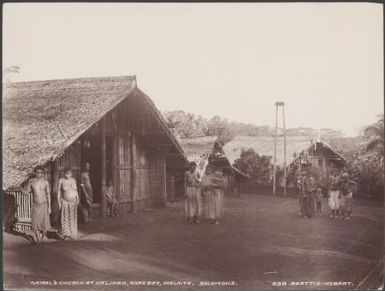 Local people outside the church and gamal at Halihan, Malaita, Solomon Islands, 1906 / J.W. Beattie