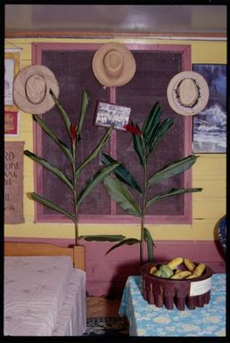 Room interior with tanoa fai'ava filled with fruit