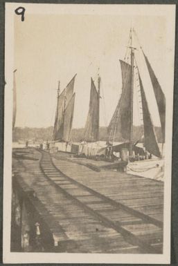 Boats from coconut plantations bringing copra to be put on ships for Australia, Rabaul, New Britain Island, Papua New Guinea, approximately 1916