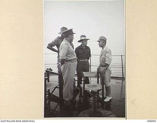 MUSCHU ISLAND, NEW GUINEA. 1945-11-26. ELEVEN HUNDRED JAPANESE TROOPS OF 18 JAPANESE ARMY LEFT THE WEWAK AREA ON THE JAPANESE CRUISER KASHIMA TO RETURN TO JAPAN. THEY ARE THE FIRST JAPANESE TROOPS ..