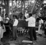 Piula club preparing coffin for burial