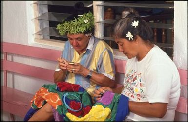 Two women sewing tivaevae