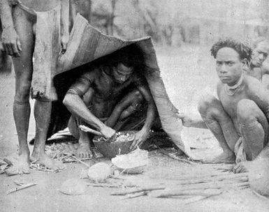 ["Steam bath to drive out sickness, Orokaiva Papua, New Guinea."]