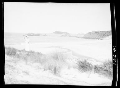 [A woman looks toward to the Pacific Ocean - Ocean Beach]