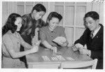 The Enseki family, May and Richard, Jr., and their parents, Mr. and Mrs. Richard K. Enseki, enjoy a game of