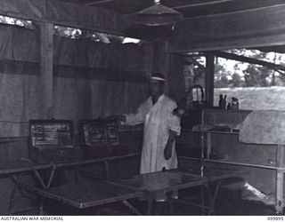 RABAUL, NEW BRITAIN, 1946-02-15. THE OPERATING THEATRE, AT THE CAMP HOSPITAL, 5 GROUP CAMP. THE CAMP IS ONE OF THIRTEEN GROUP CAMPS ESTABLISHED AROUND RABAUL FOR THE CONCENTRATION OF JAPANESE ..