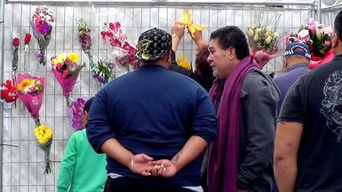 Prayer and singing vigil for dead Islanders