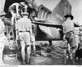 Use of transport planes in New Guinea enables speedy evacuation of wounded from forward areas to the base. Compared with their trek across the Owen Stanleys, which took days, wounded have been ..