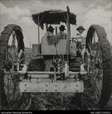 Famers on tractor with Field Officer