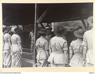RABAUL, NEW BRITAIN. 1945-10-28. GENERAL SIR THOMAS A. BLAMEY, COMMANDER-IN-CHIEF, ALLIED LAND FORCES, SOUTH WEST PACIFIC AREA, TALKING TO MEMBERS OF AUSTRALIAN ARMY NURSING SERVICE AFTER ..