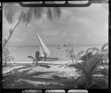 Akaiami beach, Aitutaki, Cook Islands, showing sail boat and TEAL (Tasman Empire Airways Limited) Flying boat