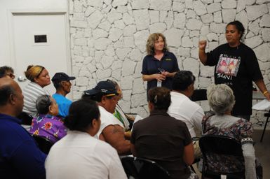 Earthquake ^ Tsunami - Utulei, American Samoa, October 8, 2009 -- FEMA Disaster Recovery Center support personnel, Maryanne Hills, explains the registration process to a group of residents affected by the tsunami while FEMA local hire, Masina G. Cime, provides critical translation service for non-English speaking individuals. David Gonzalez/FEMA