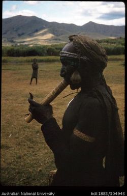 Older man smoking native pipe, Korofeigu