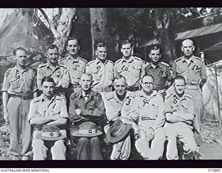 FINSCHHAFEN, NEW GUINEA. 1944-06-19. GROUP PORTRAIT OF OFFICERS AT 106TH CASUALTY CLEARING STATION. LEFT TO RIGHT: FRONT ROW: NX88371 MAJOR (MAJ) A. MCGUINNESS, 2/9TH GENERAL HOSPITAL; NX147234 MAJ ..