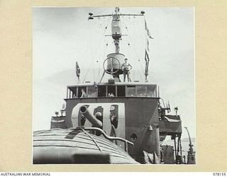 MIOS WUNDI, DUTCH NEW GUINEA. 1944-11-15. THE BRIDGE AND MAST OF THE ROYAL AUSTRALIAN NAVY VESSEL HMAS KIAMA AS SEEN FROM THE FORECASTLE